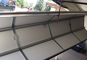 Amarr Carriage style garage door off its tracks before replacement in Danville, CA